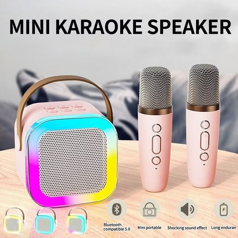 K12 Bluetooth Mini Karaoke Speaker with 2 Microphones (Category: Soundbars, Speakers & Amplifiers) located in Paranaque City. Submitted by audioaddict0517 (Listing ID 1428425965, Image 1). Description: Enjoy karaoke anywhere with this portable K12 Bluetooth speaker! It comes with two microphones and features multiple playback modes: AUX, TF card, USB, and Type-C charging. The speaker has RGB colored lights and a handle for easy carrying. It is co