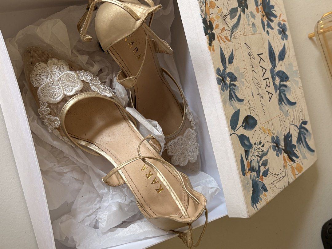 KARA ZAPATOS CUSTOMIZED BRIDAL SHOES (Category: Heels) located in Manila. Submitted by prelovedbymrsd (Listing ID 1428322764, Image 2). Description: Selling my customized bridal shoes Used it a few hours during the wedding SHOE DETAILS Size: size 7 Color / Materials: gold strap (self-tie) HEEL HEIGHT: 3 inches pointed heels very comfortable to wear 🤍 Had it custom made for ₱4,000 Selling it for 2,300 LOC: BF Homes,Parañaque.