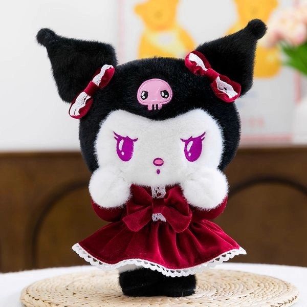 Kuromi Plush Doll 25cm (Category: Plushies & Soft Toys) located in Manila. Submitted by basicstuffmnl (Listing ID 1428392645, Image 2). Description: Adorable Kuromi plush doll featuring a black and white design with a red dress and bows. It has a skull on its forehead and purple eyes. The plush is soft and cuddly, perfect for any Sanrio fan. It's a great addition to any collection or a lovely gift for someone special..