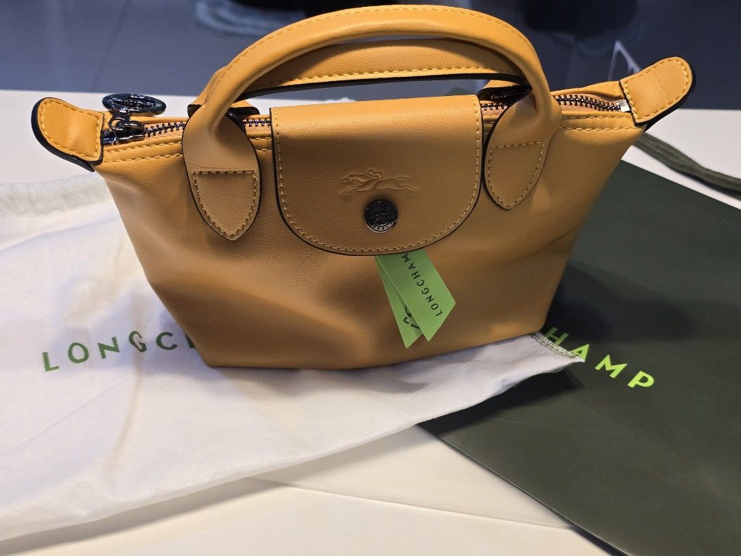 Longchamp Le Pliage Cuir XS (Category: Luxury Bags & Wallets) located in Cebu City. Submitted by drakenguard (Listing ID 1428383435, Image 1). Description: brand new comes with dust bag and paper bag.