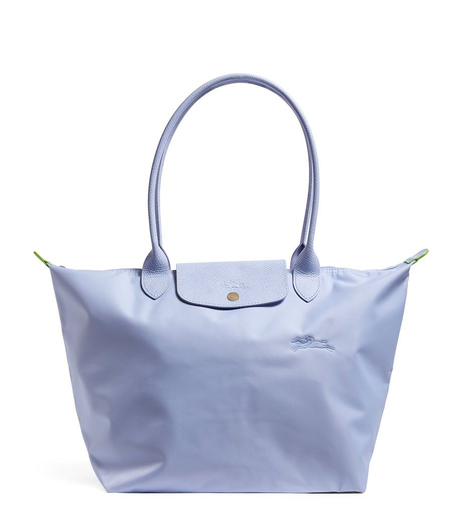 Longchamp Le Pliage Tote Bag (Category: Luxury Bags & Wallets) located in Manila. Submitted by asianbaddie (Listing ID 1428302195, Image 1). Description: Original Longchamp Le Pliage Tote Bag Pastel Blue Large It’s my aunt’s pasalubong from US. Priced at around P11,000.00 in Rustan’s. Slightly used. Needs minimal cleaning. 9/10 Flaws all posted in photos No more box and tags. Feel free to ask bag professionals to authenticate if this is original 