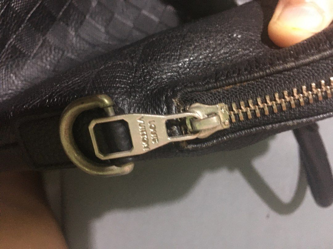 Louis Vuitton Black Leather Briefcase (Category: Luxury Bags & Wallets) located in Makati City. Submitted by unloadealr (Listing ID 1428384443, Image 3). Description: vintage this is made prior the coding system leather feels luxurious even at its age, looks very elegant strap probably left abroad will ship it for sure buyer.