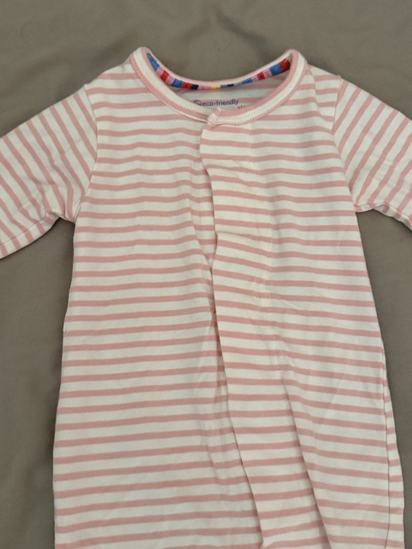 Magnetic Me Newborn Striped Frogsuit (Category: Babies & Kids Fashion) located in Makati City. Submitted by patchmaru (Listing ID 1428305950, Image 2). Description: Magnetic pink frogsuit, newborn size. Footed and with built-in mittens. Used atleast 2x only. No flaws/issues. In like new condition. Pwedeng pang going home outfit ni baby. Perfect for nesting mommas! 📍Mandaluyong City.
