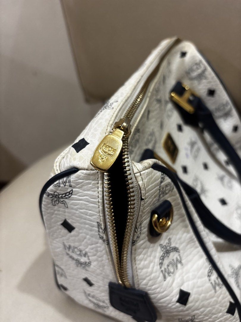 MCM Boston Bag White (Category: Luxury Bags & Wallets) located in Cainta. Submitted by jellmagic17 (Listing ID 1428355844, Image 3). Description: MCM bag authentic Used with some minor discoloration No strap .