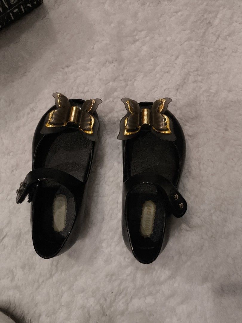Mini Melissa Black Butterfly Shoes (Category: Babies & Kids Fashion) located in Quezon City. Submitted by apsmedown (Listing ID 1428347189, Image 1). Description: replica 1st class .
