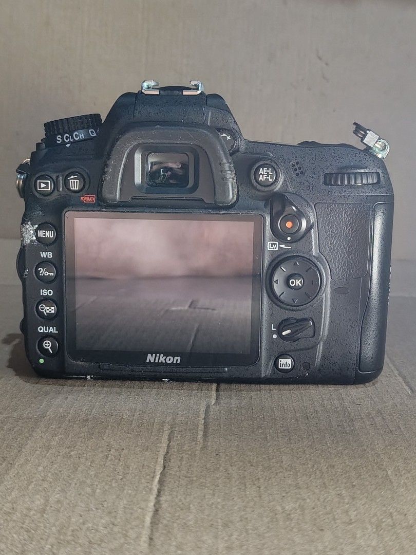 Nikon D7000 DSLR Camera with Lens (Category: Cameras) located in Manila. Submitted by jiccafran03941 (Listing ID 1428341602, Image 3). Description: nikon d7000 with sigma 28-200 shuttercount 10k comes with third party battery grip 2 original batteries and original charger issue lens fungus can be swap to higher model of nikon or sony mirrorless i will add another nikon d7000 30k shutter count with original battery grip (mb d11) nikon 24-70 2.8 / 