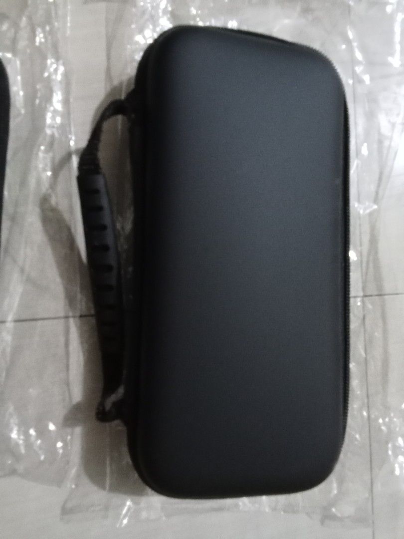NINTENDO SWITCH LITE HARD POUCH (Category: Cases & Covers) located in Quezon City. Submitted by hajjasittienor (Listing ID 1428419636, Image 1). Description: BRAND NEW NINTENDO SWITCH LITE ACCESSORIES. HARD POUCH.300 CRYSTAL CASE.300 TEMPERD GLASS 200 SILICON CASE.300 THUM GRIP.100 AC CHARGER ADAPTOR.850 .PWEDE PICK UP .PWEDE GCASH AVIDA TOWER NEW MANILA COL BONNY SERRANO AVE QC.
