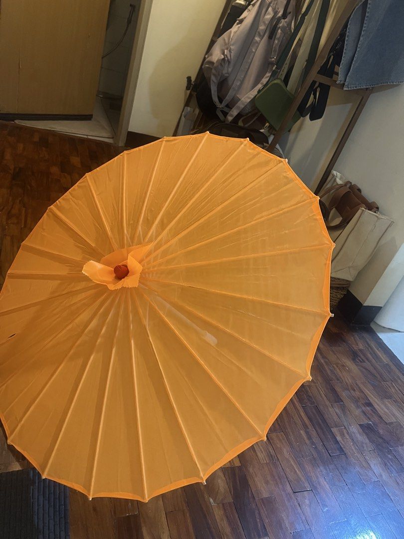 Orange Parasol Umbrella (Category: Umbrellas) located in Quezon City. Submitted by jillylilly (Listing ID 1428360062, Image 3). Description: Orange parasol umbrella. Bright and stylish. Perfect for photoshoot or events. .