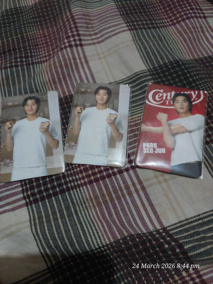 Park Seo Jun Century Tuna Photocards (Category: K-Wave Merchandise) located in Pasig City. Submitted by catherine030993 (Listing ID 1428266508, Image 1). Description: Set of Park Seo Jun Century Tuna photocards. Includes three photocards featuring Park Seo Jun in a white shirt, and one card with a Century Tuna design. The back of the cards have signatures. All cards are in their original packaging..
