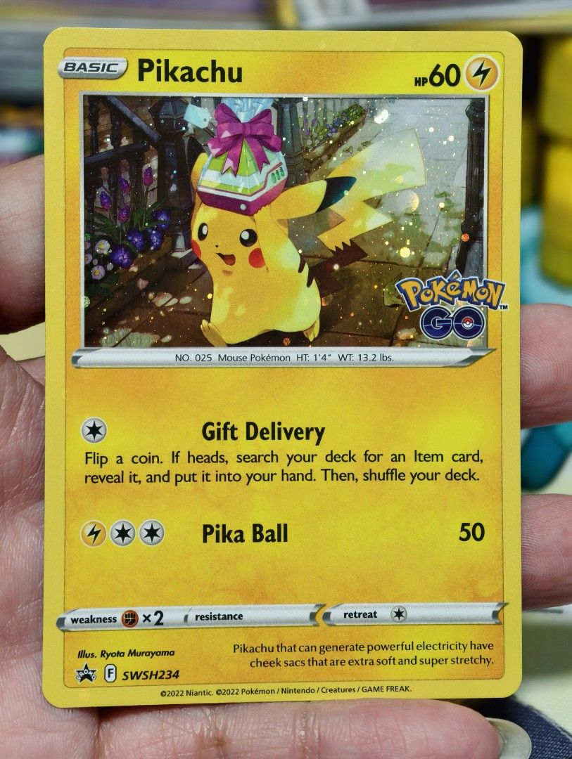 Pikachu SWSH234 LP 2022 Cosmos Holo Black Star Promo Pokemon GO Card,  Hobbies & Toys, Toys & Games on Carousell