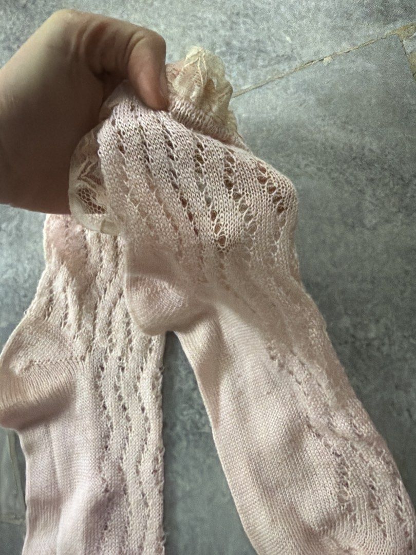 Pink long socks (Category: Socks & Tights) located in Subang Jaya. Submitted by chocomintttt (Listing ID 1428362147, Image 2). Description: Lace missing on one of the sock as shown In good conditon. Impulsive bought.