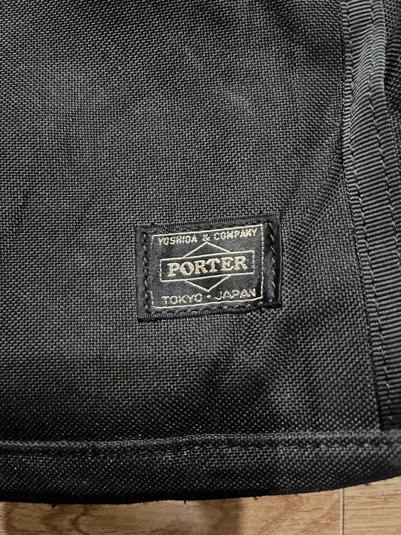 Porter Tokyo Japan Briefcase (Category: Briefcases) located in Zamboanga. Submitted by alterramz08 (Listing ID 1428419454, Image 3). Description: PORTER Clip Briefcase Black Verygood condition Price : 1,200 Black briefcase from Porter Tokyo Japan. Features a top handle and a shoulder strap. Includes multiple compartments with zippers. Made in Japan. The bag has the Porter logo on the front and inside. The bag has a rectangular shape. .