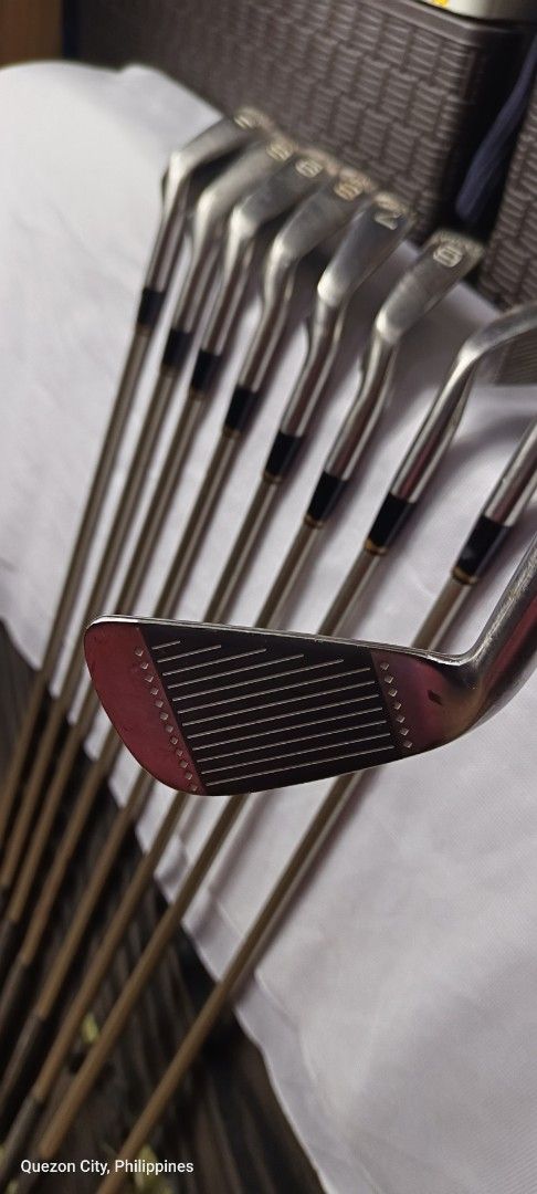 Spalding Golf Club Iron set (Category: Golf) located in Manila. Submitted by yeonmei5614747 (Listing ID 1428284316, Image 3). Description: Complete set of Extra golf clubs. Includes clubs numbered 3, 4, 5, 6, 7, 8, 9, and P. The club heads are silver with black grips. The shafts are a gold color. S Flexx Spalding Boron Shaft Right Handed .