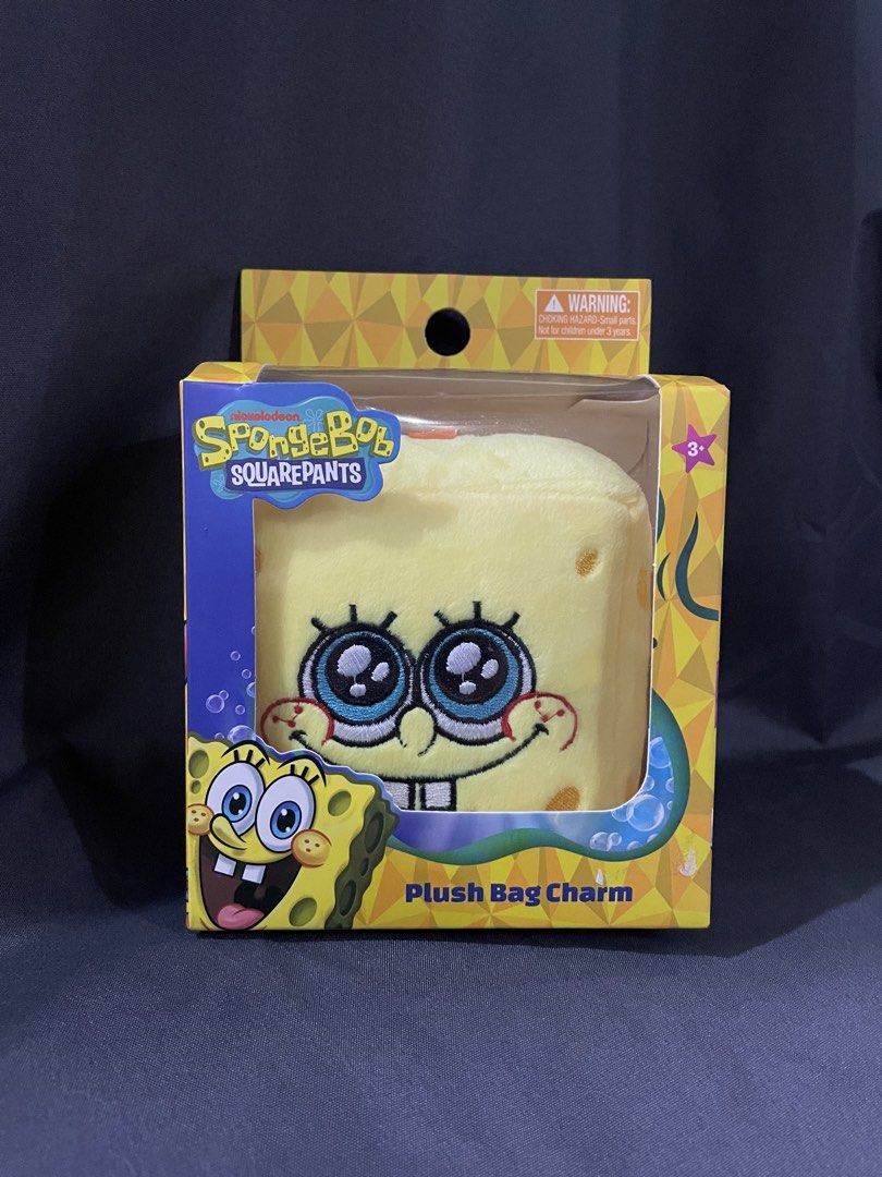 SpongeBob bag charm (Category: Character Goods) located in Dagupan City. Submitted by robithedog (Listing ID 1428282335, Image 2). Description: - SpongeBob SquarePants bag charm. - Plush material. - Features SpongeBob's iconic face. - Includes a keyring for easy attachment. - Perfect for bags, keys, or as a collectible. -sf shouldered by the buyer.