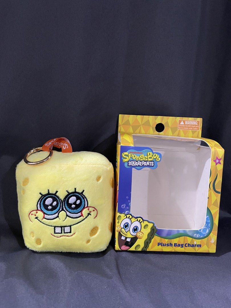 SpongeBob bag charm (Category: Character Goods) located in Dagupan City. Submitted by robithedog (Listing ID 1428282335, Image 1). Description: - SpongeBob SquarePants bag charm. - Plush material. - Features SpongeBob's iconic face. - Includes a keyring for easy attachment. - Perfect for bags, keys, or as a collectible. -sf shouldered by the buyer.