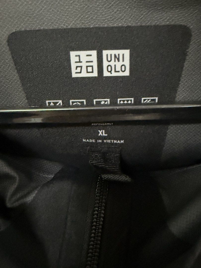 Uniqlo Black Hooded Jacket XL (Category: Coats, Jackets and Outerwear) located in Manila. Submitted by gpdeclutter (Listing ID 1428309537, Image 2). Description: Length 72cm Width 46cm.
