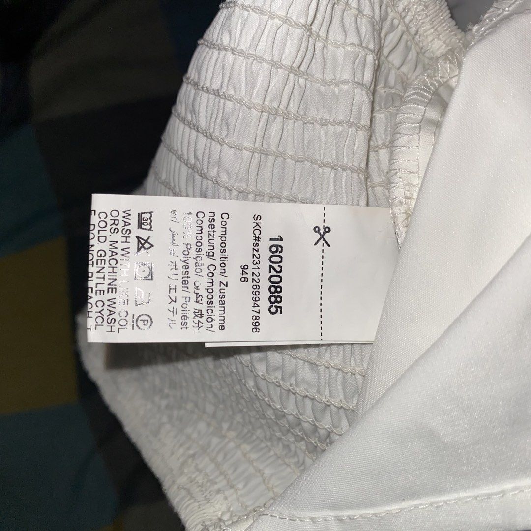 Shein White Halter Top Sleeveless (Category: Sleeveless) located in Pasig City. Submitted by preloved_mnla (Listing ID 1428269268, Image 3). Description: size small to medium frame. Never worn, with tags.