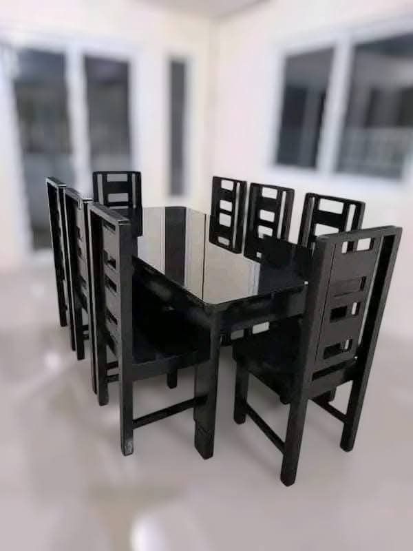 Wooden Dining Table Set with Chairs (Category: Tables & Sets) located in Mabalacat. Submitted by arlenemamangun01 (Listing ID 1428296070, Image 3). Description: High-quality Dining table set at an affordable price👌 Materials used: 📌Gemelina & mahogany wood 📌Uratex foam 📌German leather & fabric 📌Duco paint finished MADE TO ORDER⚒️ NO DP NEEDED✅ FREE TOP GLASS😍 COD & FREE DELIVERY 4 seater (3ft by 4ft) 6 seater (3ft by 5ft) 8 seater (3ft by 6