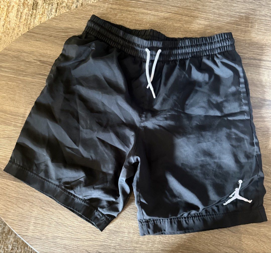 Authentic Nike Jordan black woven shorts (Category: Babies & Kids Fashion) located in Quezon City. Submitted by iamannp (Listing ID 1428463891, Image 2). Description: Authentic Jordan shorts Store bought Pls expect signs of usage as this is a used item Size is medium Will fit 9-12 yo.