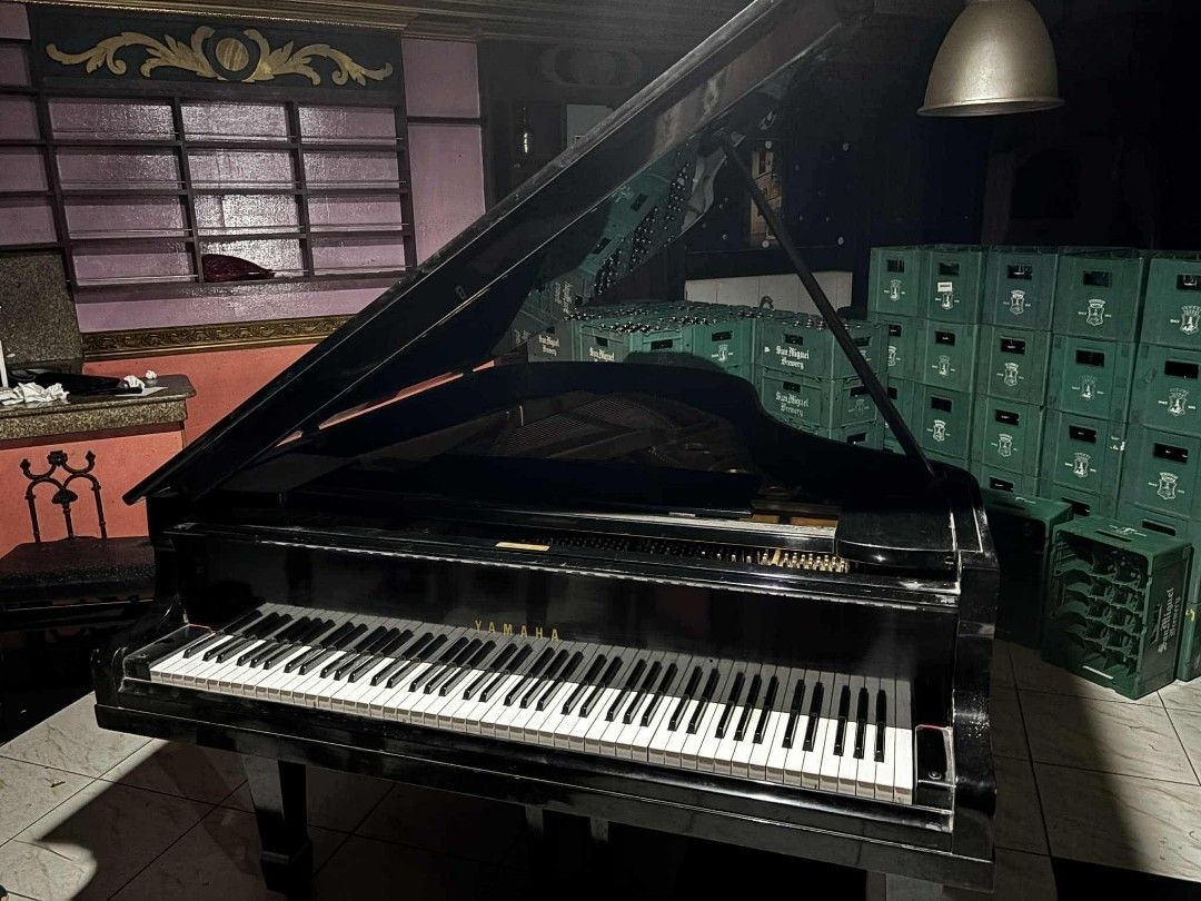 Black Grand Piano (Category: Musical Instruments) located in Quezon City. Submitted by mikelfx (Listing ID 1428546423, Image 2). Description: Elegant black grand piano. Features a full keyboard with black and white keys. The piano has a glossy finish. Perfect for music enthusiasts or those looking to add a touch of sophistication to their space..