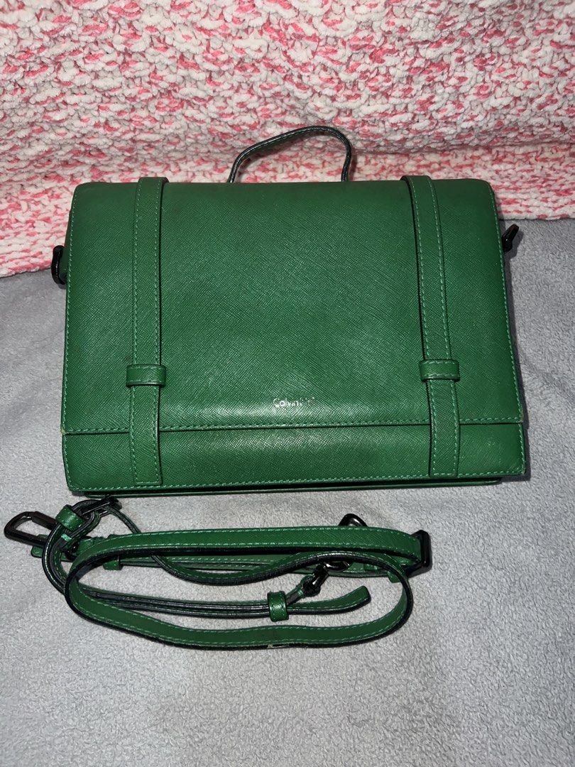 Calvin Klein Green Crossbody Bag (Category: Cross-body Bags) located in Bulacan. Submitted by thriftstationplus (Listing ID 1428560855, Image 1). Description: Made in China ✅ Overall Condition - 8/10 💯 % Genuine Leathher 🏆Condition of: 🐮Leather - 7.8/10 🪨 Edge Paint - 7/10 🛠️Hardwares - 8.5/10 ➰Strap/Sling - 7.4/10 📉Lining/Edges - 8/10 🧐Interior - 8/10 🧬Measurements: * Height: * Length: * Width: * Strap/Sling: : Can Be Handheld or Crossbo