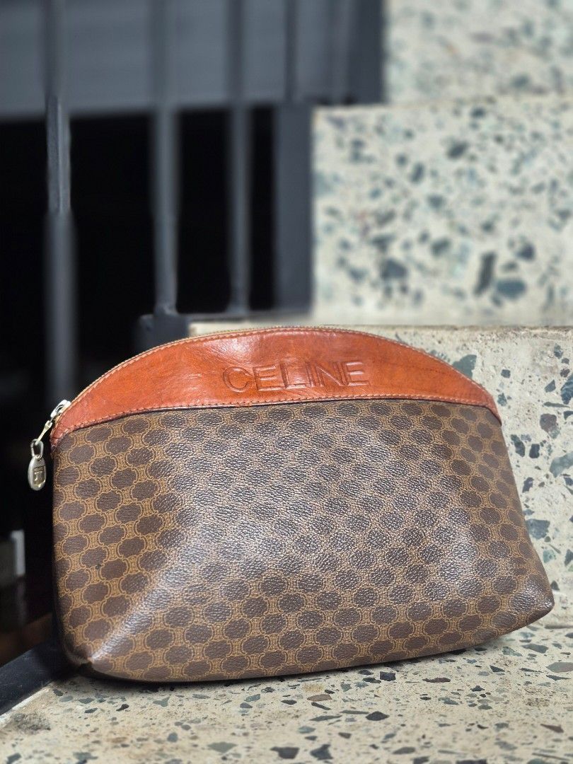 Celine Brown Monogram Pouch (Category: Luxury Bags & Wallets) located in Cainta. Submitted by Gp0ps (Listing ID 1428438665, Image 1). Description: classic celine macadam purse.