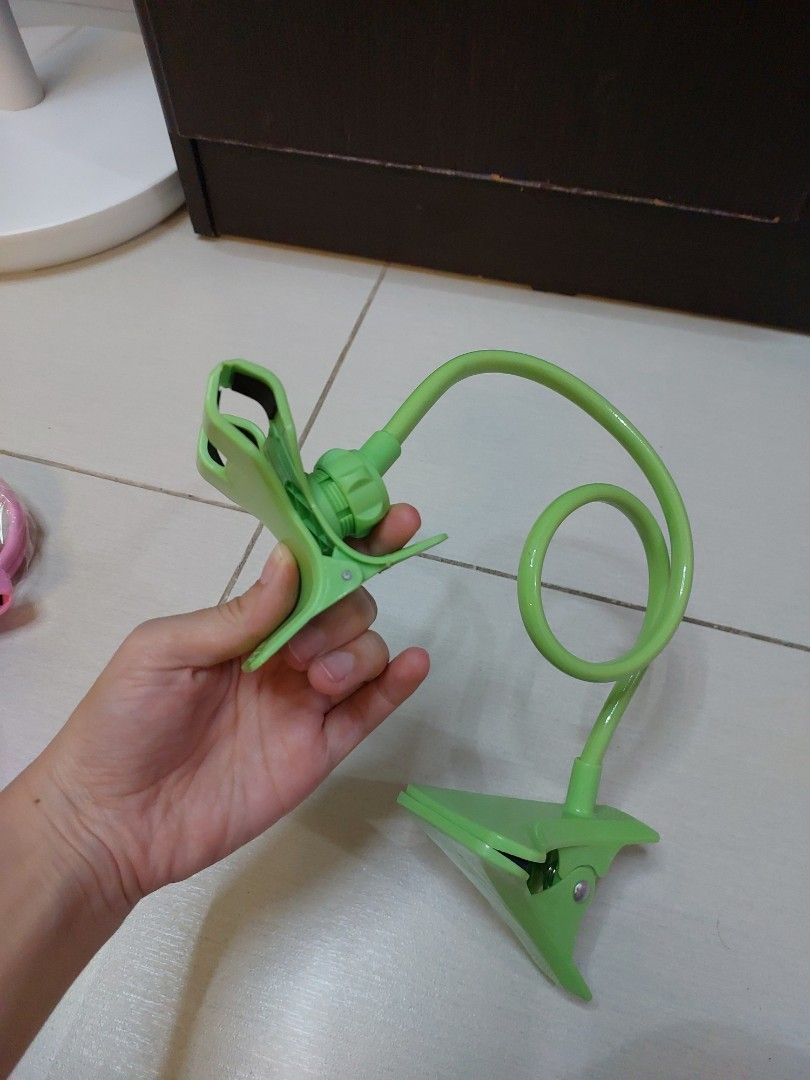 Cellphone holder stand (Category: Mounts & Holders) located in Makati City. Submitted by monicaelise (Listing ID 1428541806, Image 1). Description: in perfect condition.