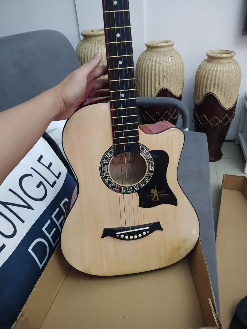 Davis Acoustic Guitar Brand New (Category: Musical Instruments) located in Quezon City. Submitted by diwaguitars (Listing ID 1428509104, Image 1). Description: Trusted Seller of Legit and Affordable Guitars Message for more information Davis Acoustic Guitar with Truss Rod 38 Inches 1,400 With guitar bag 1,500 With guitar bag, guitar strap, set of strings, capo, and picks I reply fast and offer the most affordable guitar packages. Feel free to mes