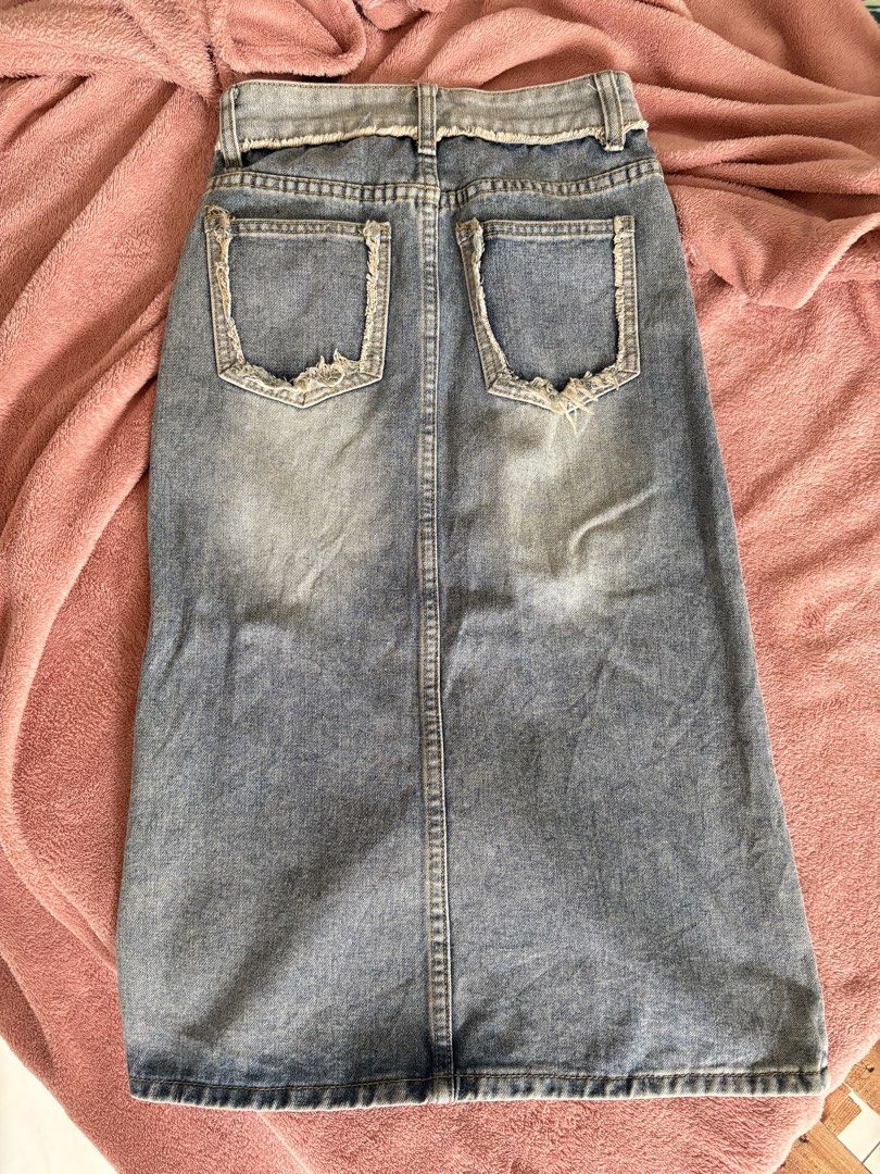 Denim Skirt with Slit - Size XS (Category: Skirts) located in San Carlos City. Submitted by sellwsel (Listing ID 1428492806, Image 2). Description: - edgy denim midi skirt - perf for that ragged look - best fits xxs-xs mop: gcash/maya mod: j&t/lbc.