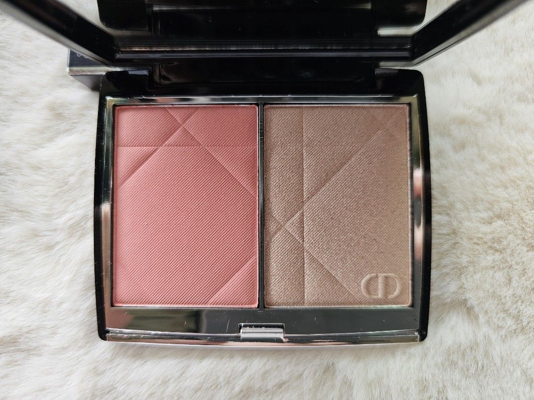Dior Rouge Blush Colour & Glow Palette (Category: Makeup) located in Mandaluyong City. Submitted by heartallthingspretty (Listing ID 1428439700, Image 1). Description: Dior Rouge Blush Colour & Glow palette features a blush and highlighter. The blush is a coral-pink shade, and the highlighter is a bronze-toned colour. The palette includes a mirror. The back of the palette indicates the shade is 257 Dioriviera Blush & Glow. It is a compact size, p