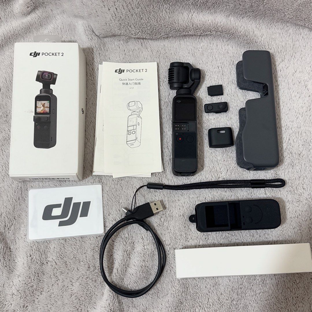 DJI Osmo Pocket 2 Complete Set (Category: Video Cameras) located in Cabanatuan. Submitted by jel.co20 (Listing ID 1428565006, Image 1). Description: DJI Osmo Pocket 2 Complete Set - Compact and portable - Includes all original accessories - Perfect for vlogging and content creation - Ready to use no sd card included minor issue dent sa last pictures pls check :)) overall excellent condition pa hindi gaano nagamit. NEGOTIABLE ☺️ FOR MORE INFO PLS 
