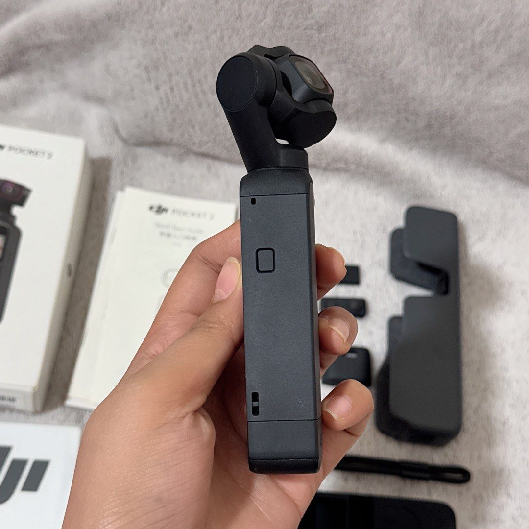 DJI Osmo Pocket 2 Complete Set (Category: Video Cameras) located in Cabanatuan. Submitted by jel.co20 (Listing ID 1428565006, Image 2). Description: DJI Osmo Pocket 2 Complete Set - Compact and portable - Includes all original accessories - Perfect for vlogging and content creation - Ready to use no sd card included minor issue dent sa last pictures pls check :)) overall excellent condition pa hindi gaano nagamit. NEGOTIABLE ☺️ FOR MORE INFO PLS 