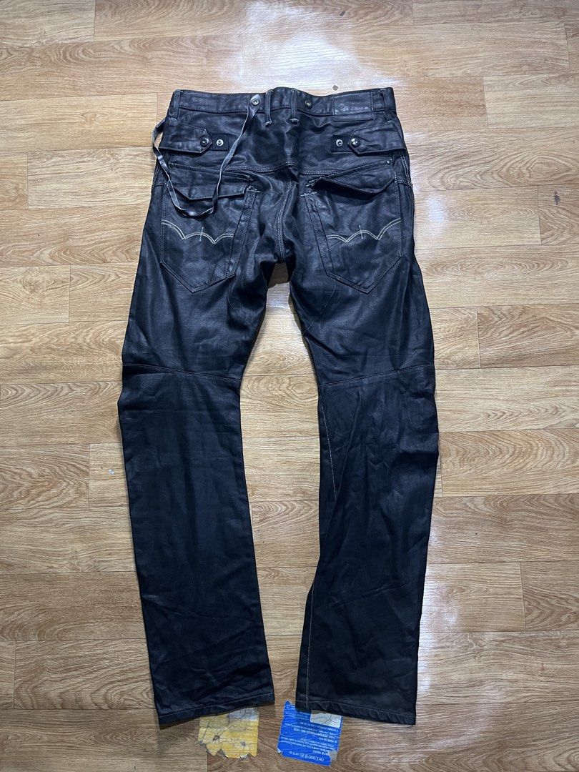 Edwin E-Function EF503 Black Jeans Size 32 (Category: Jeans) located in Zamboanga. Submitted by alterramz08 (Listing ID 1428478484, Image 2). Description: Edwin x Energy pants Size 32-33 Length 44 Thigh 12 Leg opening 8 Price : 1,200 Pesos ! Edwin E-Function EF503 jeans in black. Features a unique design with multiple pockets and a distinctive leather patch. Size 32. Made in Vietnam. The jeans have a coated finish, giving them a slightly shiny ap