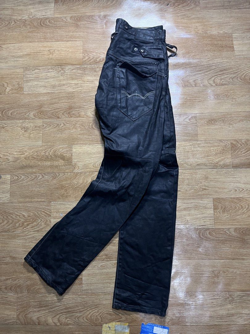Edwin E-Function EF503 Black Jeans Size 32 (Category: Jeans) located in Zamboanga. Submitted by alterramz08 (Listing ID 1428478484, Image 3). Description: Edwin x Energy pants Size 32-33 Length 44 Thigh 12 Leg opening 8 Price : 1,200 Pesos ! Edwin E-Function EF503 jeans in black. Features a unique design with multiple pockets and a distinctive leather patch. Size 32. Made in Vietnam. The jeans have a coated finish, giving them a slightly shiny ap