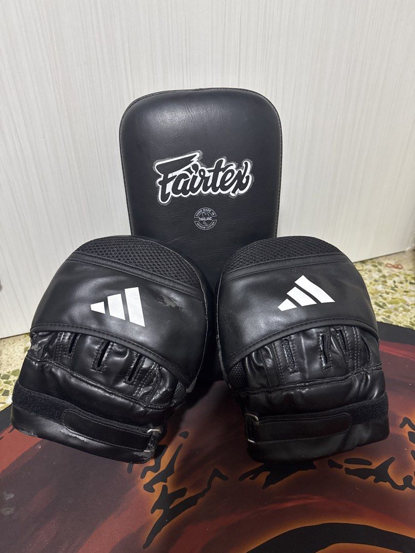 Fairtex Muay Thai Kick Pad and Adidas Focus Mitts (Category: Other Sports Equipment and Supplies) located in Singapore. Submitted by prelovedclosetxx (Listing ID 1428482715, Image 1). Description: $90 for this bundle set , take and go ! 😉.