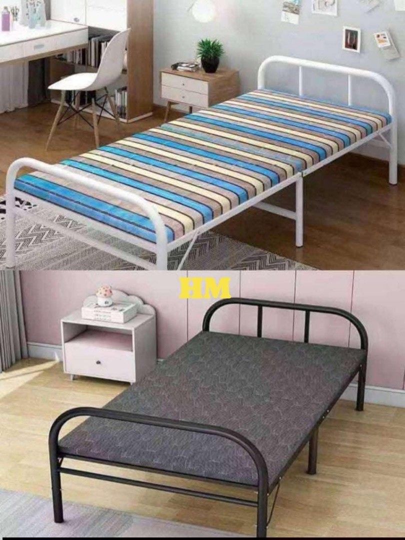 Folding Bed - Metal Frame (Category: Other Sports Equipment and Supplies) located in Manila. Submitted by yzcartph (Listing ID 1428434546, Image 1). Description: Durable folding bed with a metal frame. Features a striped mattress and a dark gray mattress option. The bed is designed for easy storage and portability. Suitable for guest rooms or small spaces. Available in two color options: white frame with striped mattress and black frame with gray