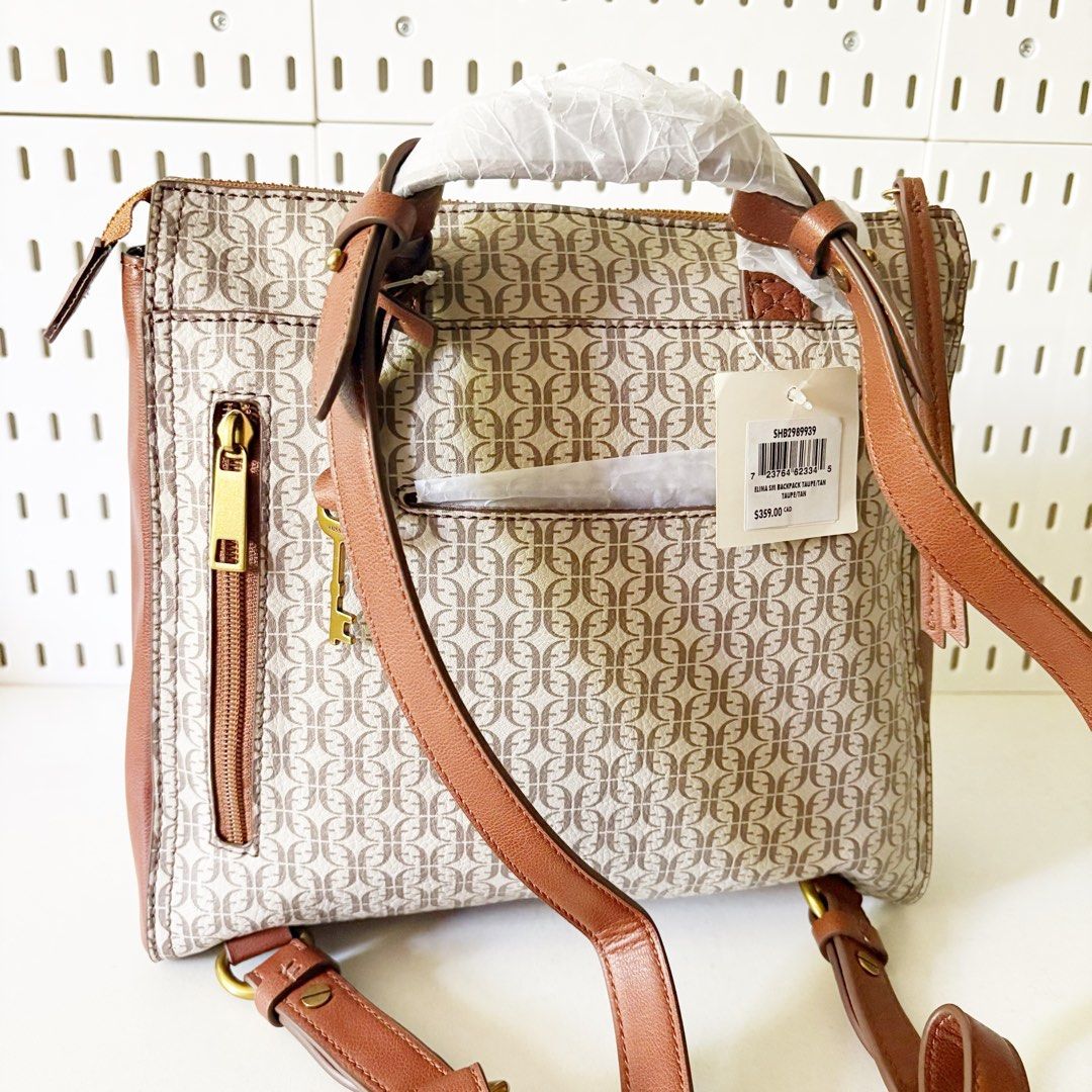 Fossil Elina SM Backpack Taupe/Tan (Category: Backpacks) located in Caloocan City. Submitted by _yownice (Listing ID 1428574460, Image 2). Description: Fossil Elina SM Backpack Taupe/Tan 100% original Onhand and ready to ship Inclusions: tag and fossil paperbag Actual photos and final price posted. Product Details: Material: Printed PVC/Polyurethane Trim Interior Material: 100% Polyester Interior Details: 1 Slide Pocket, 1 Zipper Pocket Measureme