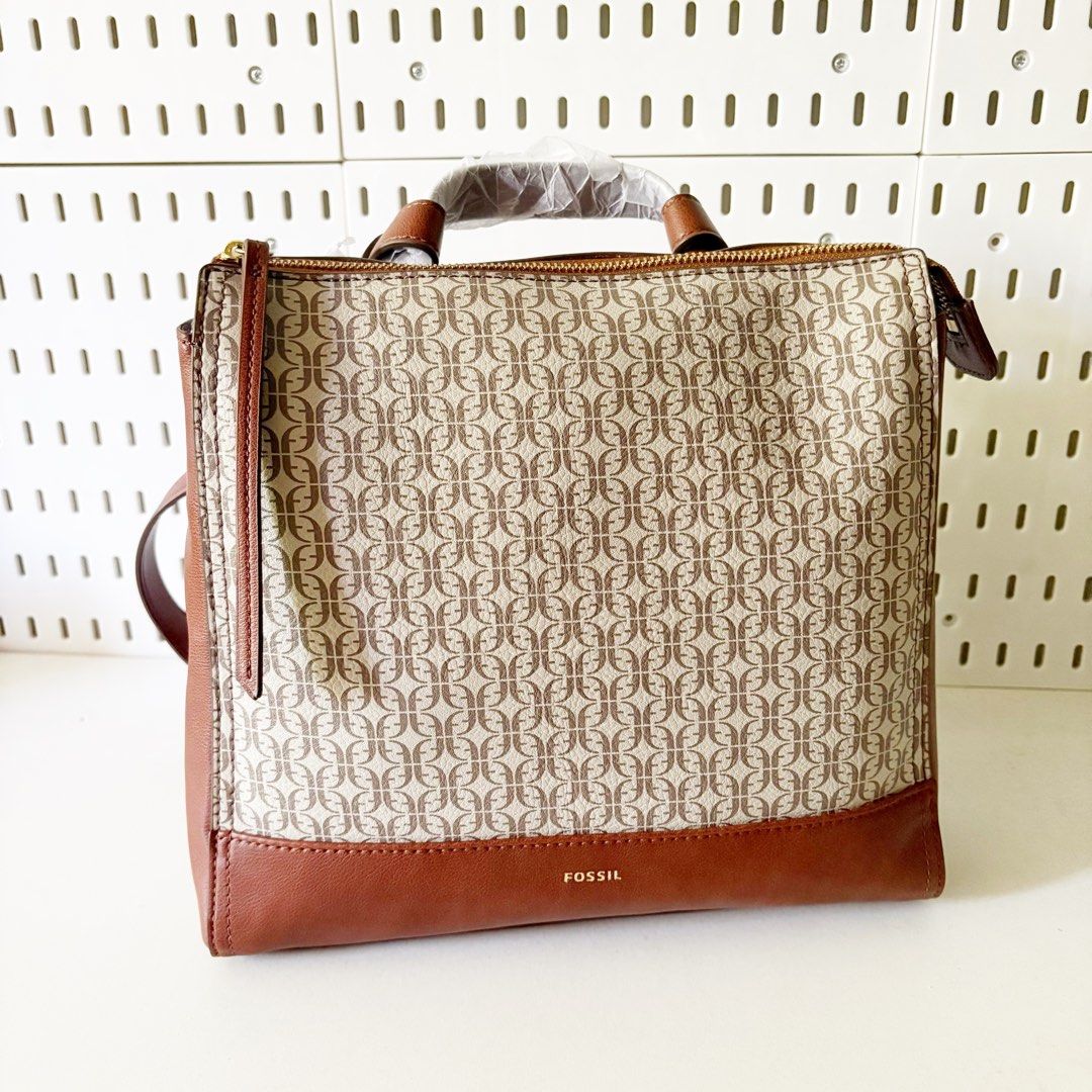 Fossil Elina SM Backpack Taupe/Tan (Category: Backpacks) located in Caloocan City. Submitted by _yownice (Listing ID 1428574460, Image 1). Description: Fossil Elina SM Backpack Taupe/Tan 100% original Onhand and ready to ship Inclusions: tag and fossil paperbag Actual photos and final price posted. Product Details: Material: Printed PVC/Polyurethane Trim Interior Material: 100% Polyester Interior Details: 1 Slide Pocket, 1 Zipper Pocket Measureme