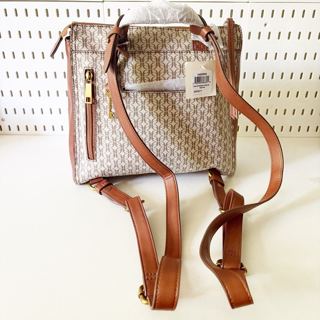 Fossil Elina SM Backpack Taupe/Tan (Category: Backpacks) located in Caloocan City. Submitted by _yownice (Listing ID 1428574460, Image 3). Description: Fossil Elina SM Backpack Taupe/Tan 100% original Onhand and ready to ship Inclusions: tag and fossil paperbag Actual photos and final price posted. Product Details: Material: Printed PVC/Polyurethane Trim Interior Material: 100% Polyester Interior Details: 1 Slide Pocket, 1 Zipper Pocket Measureme