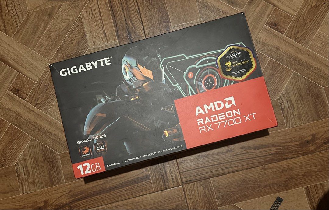 Gigabyte AMD Radeon RX 7700 XT 12GB (Category: Computer Parts) located in Manila. Submitted by oshiki (Listing ID 1428480184, Image 1). Description: Gigabyte RX 7700 XT Gaming OC 12 GB Selling: ₱18,500 Swapping: ₱22,000 Selling this Gigabyte 7700 XT with box, temps are good and consumes 210w when fully utilized and temps are around 50c. Halos same performance with 9060 XT may warranty pa sa Gigabyte since 1 year and 6 months palang siya, bought n