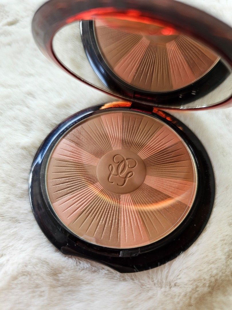 Guerlain Terracotta Light Bronzing Powder 03 (Category: Makeup) located in Mandaluyong City. Submitted by heartallthingspretty (Listing ID 1428439902, Image 1). Description: Guerlain Terracotta Light bronzing powder in shade 03 Natural Warm. The compact includes a mirror. The product is designed to give a sun-kissed glow. It is a light and long-lasting powder. The net weight is 10g / 0.35 oz. Made in France..