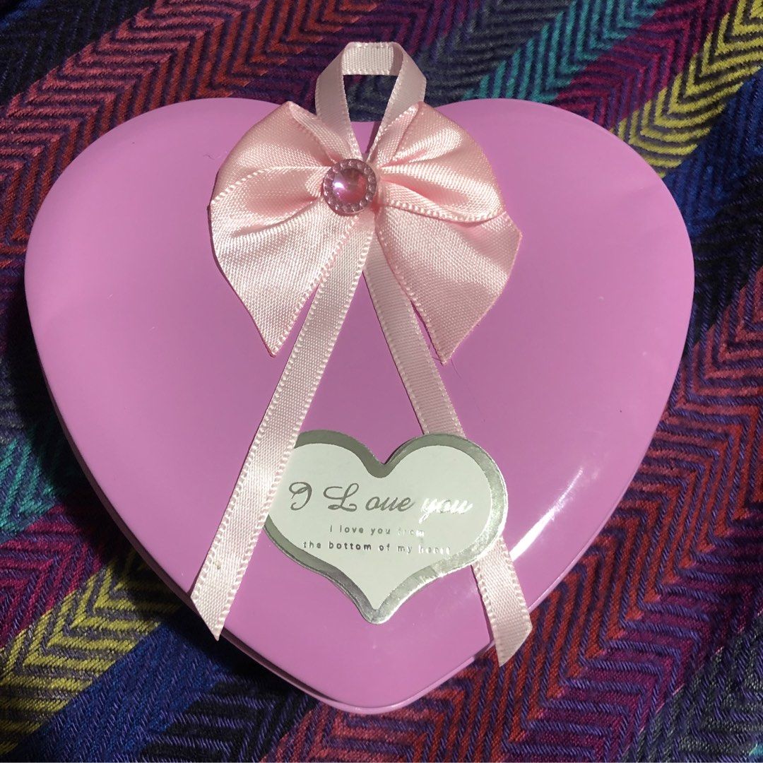 Heart-Shaped Gift Box with Teddy Bear and Roses (Category: Flowers & Bouquets) located in Mandaluyong City. Submitted by jennyitems (Listing ID 1428469495, Image 3). Description: 🌸 Lovely heart-shaped gift box contains a cute teddy bear holding an "I Love You" sign, along with three pink rose-shaped soaps. 🌸 The box is adorned with a pink bow and a "I Love You" tag. Perfect for gifting on special occasions. 🌸 Very Nice & Presentable Gift!🎁 💝
