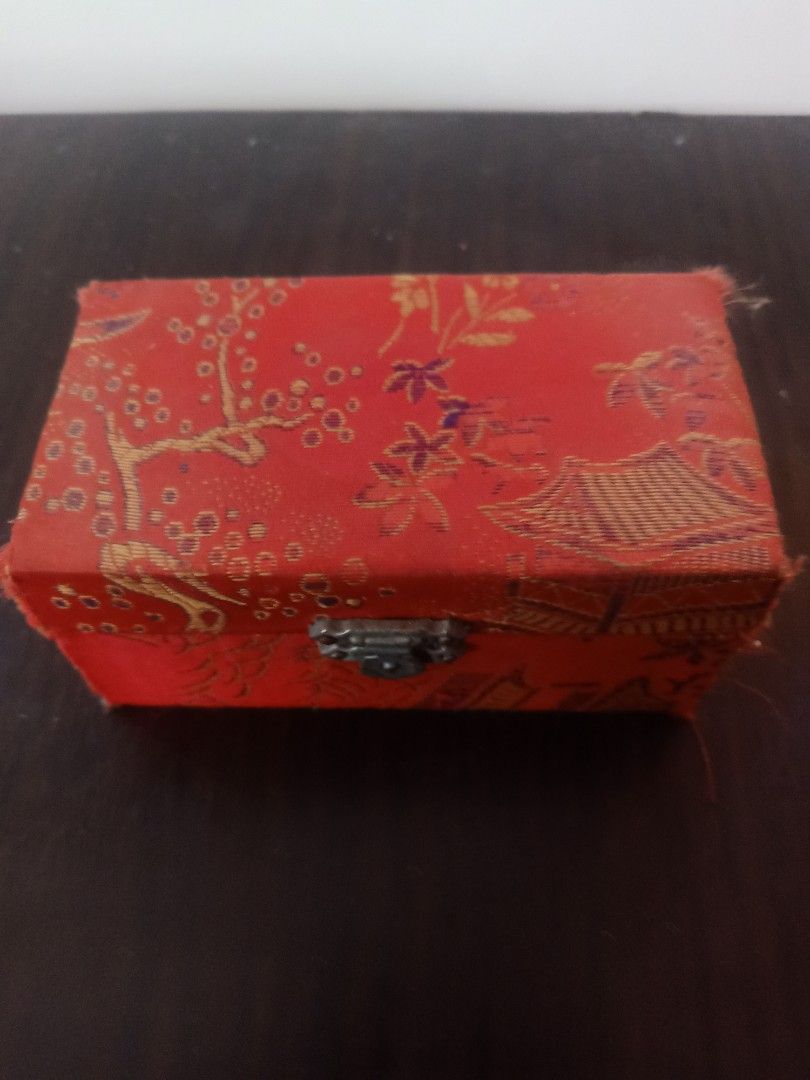 Iron Ball Direction Panda Design (Category: Vintage Collectibles) located in Las Pinas. Submitted by the_recycle_shop (Listing ID 1428520594, Image 3). Description: Set of iron balls comes in a red box with a clasp. The balls feature a panda design with bamboo. The box has a gold-colored interior with Chinese characters. The balls are made in China..