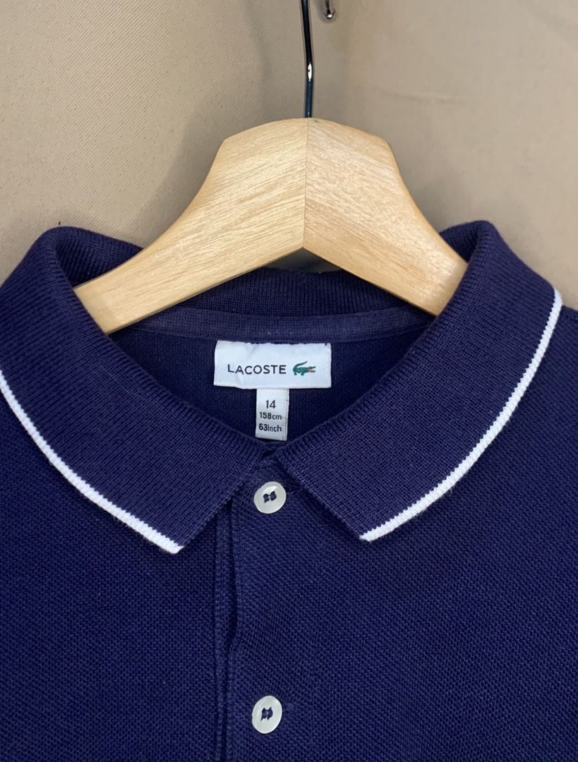 Lacoste Navy Blue Polo Shirt (Category: Tshirts & Polo Shirts ) located in Davao. Submitted by reclaimed_ph (Listing ID 1428469381, Image 3). Description: - Navy blue Lacoste Polo - Full zip - 16.5 x 23 - 9 Color rate - Very good condition - No issue .