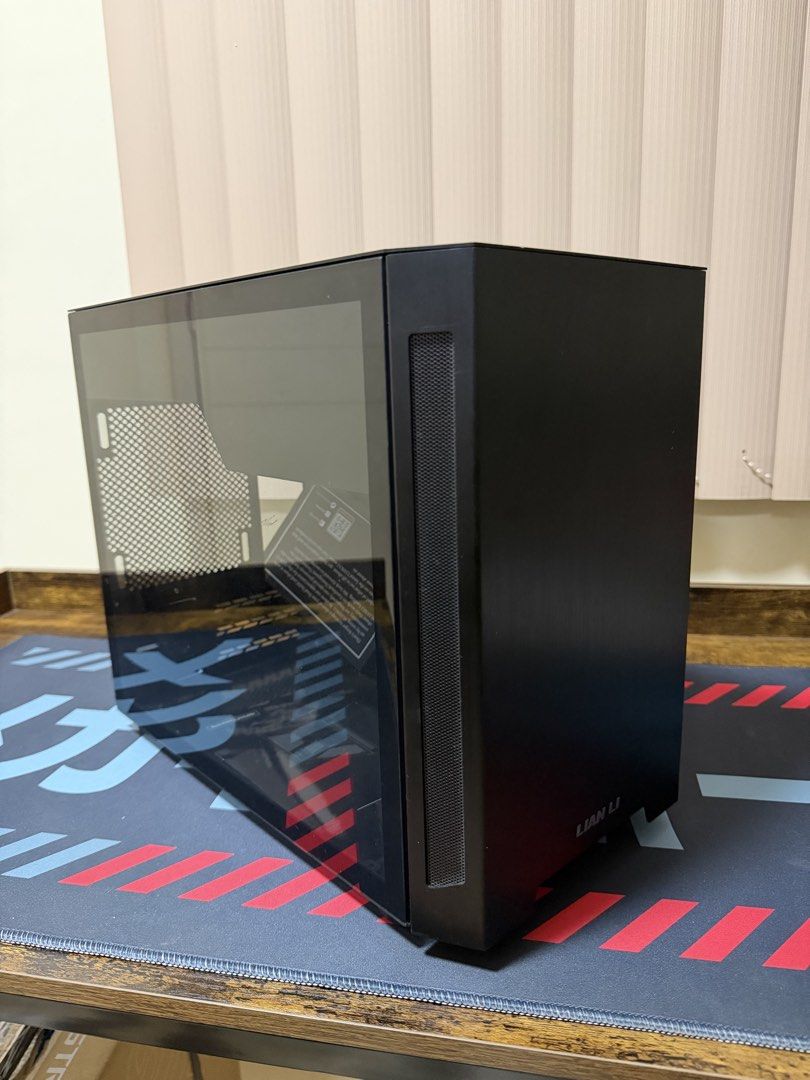 Lian Li TU150 Mini-ITX Case (Black) (Category: Computer Parts) located in Pasig City. Submitted by april_ann004 (Listing ID 1428578167, Image 2). Description: Lian Li TU150 Mini-ITX Case (Black) - 23.7L Mini-ITX Case, aluminum panel and a tempered glass side-panel - Includes a built-in handle for easy portability - Case Ports: 2 x USB 3.0, 1 x USB 3.1 Type-C .