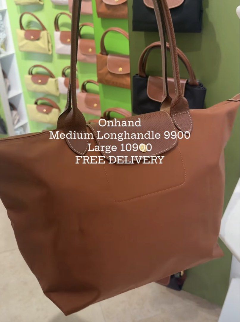 Longchamp Medium Longhandle Cognac (Category: Luxury Bags & Wallets) located in Pasay City. Submitted by theluxefinds.phonhand (Listing ID 1428507279, Image 2). Description: Storebought original longchamp with ziplock and paperbag Cognac Classic( Latest Color) .
