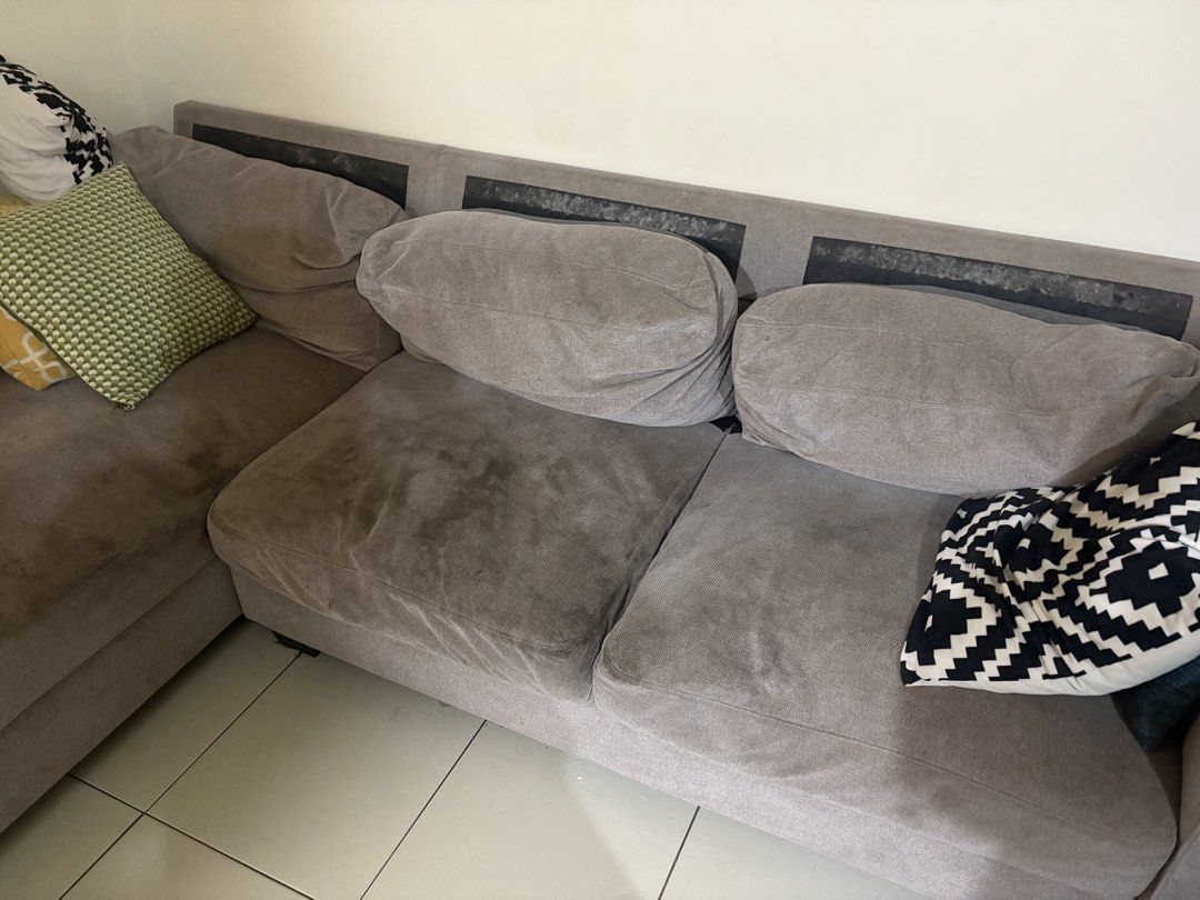 L-Shaped Grey Sofa (Category: Sofas) located in Manila. Submitted by jeung_liz (Listing ID 1428578574, Image 1). Description: Buy this sofa from All Home Very good condition, you just need to clean the sofa We need space in our home and make it more minimalist Location Taguig City.