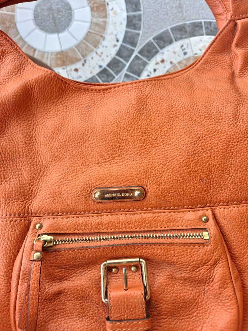 Michael Kors Orange Leather Hobo Bag (Category: Luxury Bags & Wallets) located in Manila. Submitted by jboy_thrifts (Listing ID 1428445668, Image 2). Description: Minsan lng nagamit, kaya na stock na po, offer lng po. .