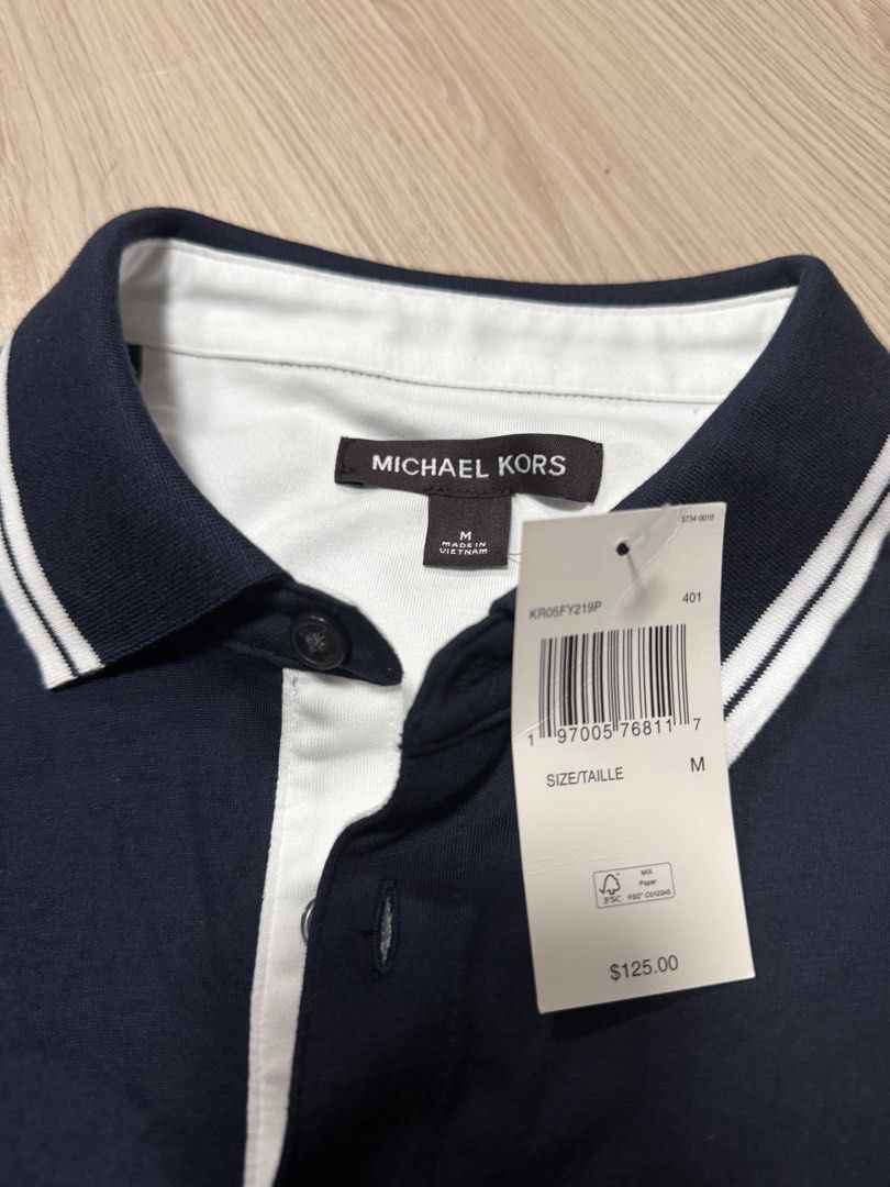 Michael Kors Polo Shirt - Navy Blue (Category: Tshirts & Polo Shirts ) located in Quezon City. Submitted by pjocs (Listing ID 1428494420, Image 2). Description: Brand new Michael kors polo shirt Size: medium Srp:125usd Selling for only 2,600 negotiable.