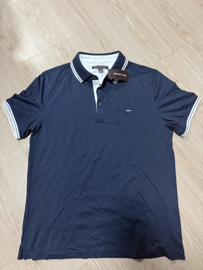 Michael Kors Polo Shirt - Navy Blue (Category: Tshirts & Polo Shirts ) located in Quezon City. Submitted by pjocs (Listing ID 1428494420, Image 1). Description: Brand new Michael kors polo shirt Size: medium Srp:125usd Selling for only 2,600 negotiable.